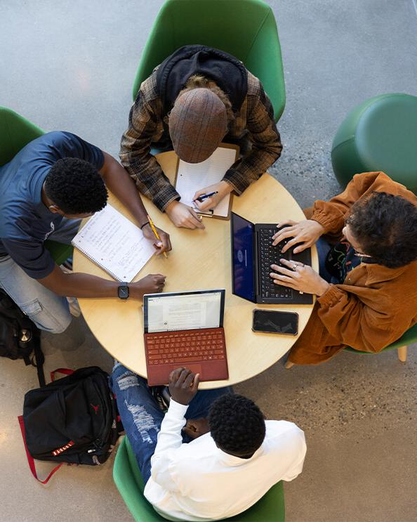 Students doing work at a table